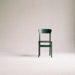 Image of a black chair in an empty room