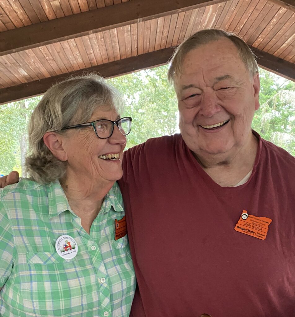 Amelia and John Wilbur smiling.