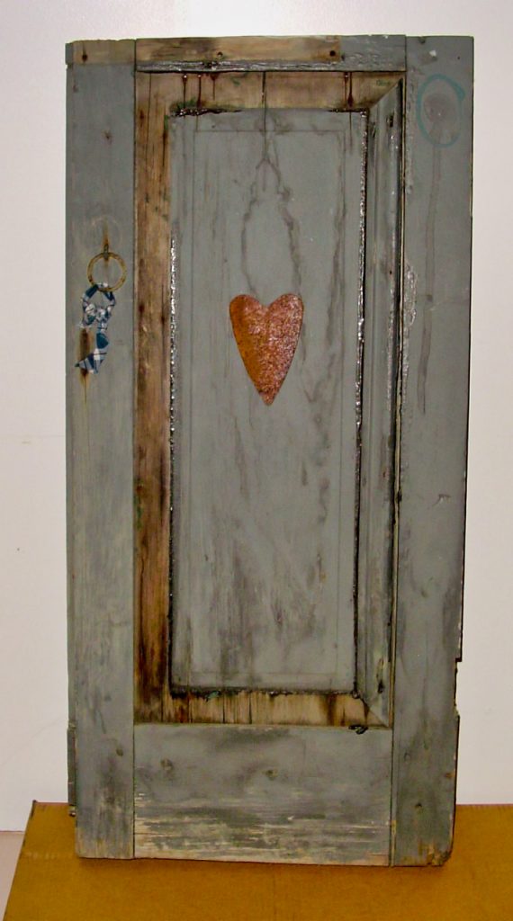 A "shabby chic" window shutter. 