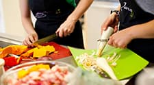 High school students serve up meals at home through adapted cooking class