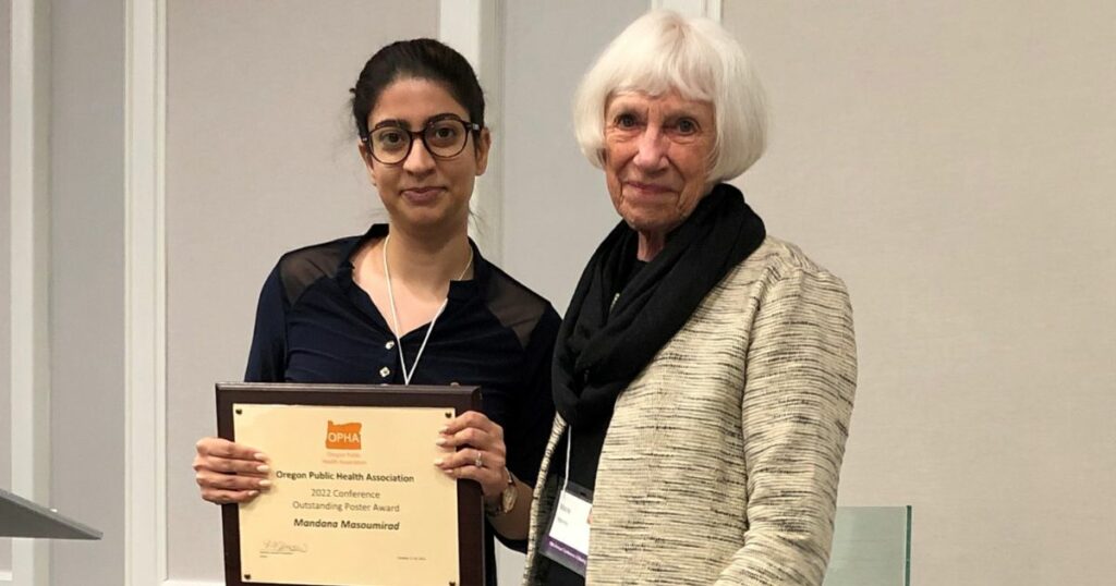 Student receives an award at the OPHA conference