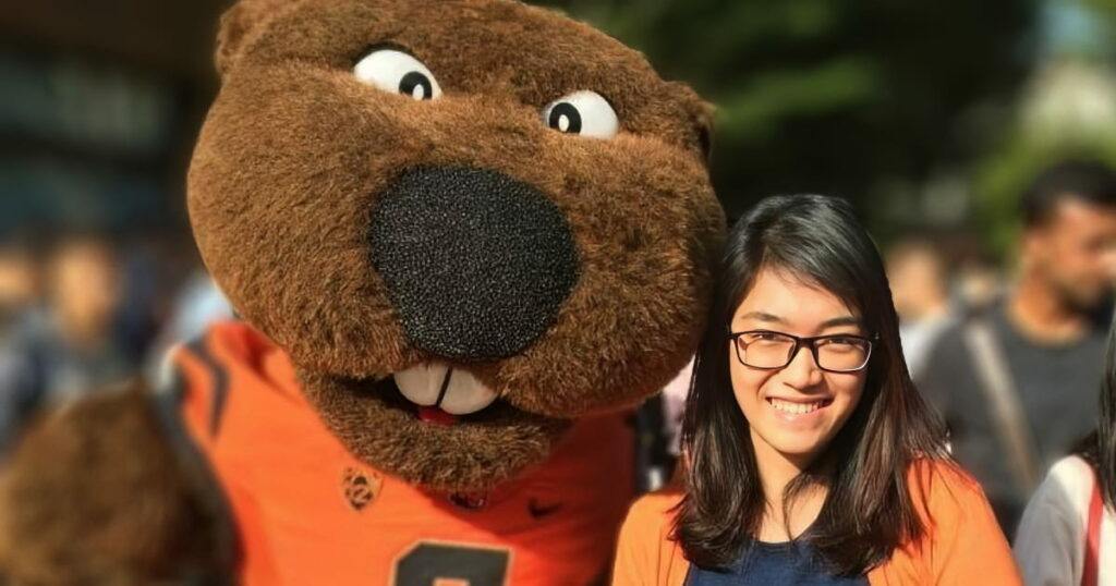 Tho Nguyen with Benny the Beaver