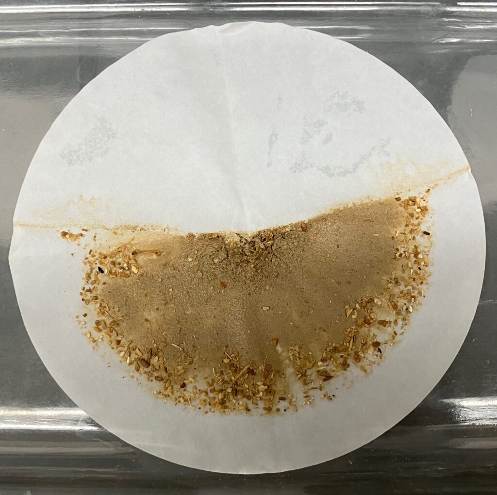 Fig. 10: Filter paper containing MP, bleached woody OM, and some sediment
