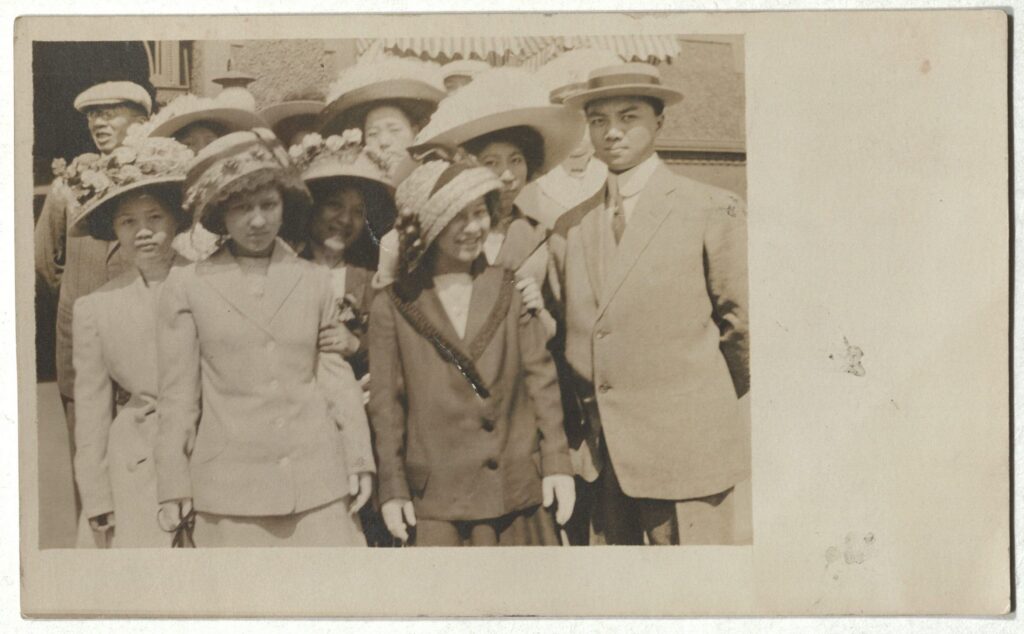 Postcard photograph, group of people in an outdoor setting