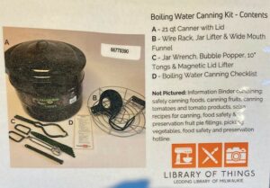 Boiling Water Canner and canning tools with inventory list. This image is attaching to the supplies when a person borrows a boiling water canner from the library.