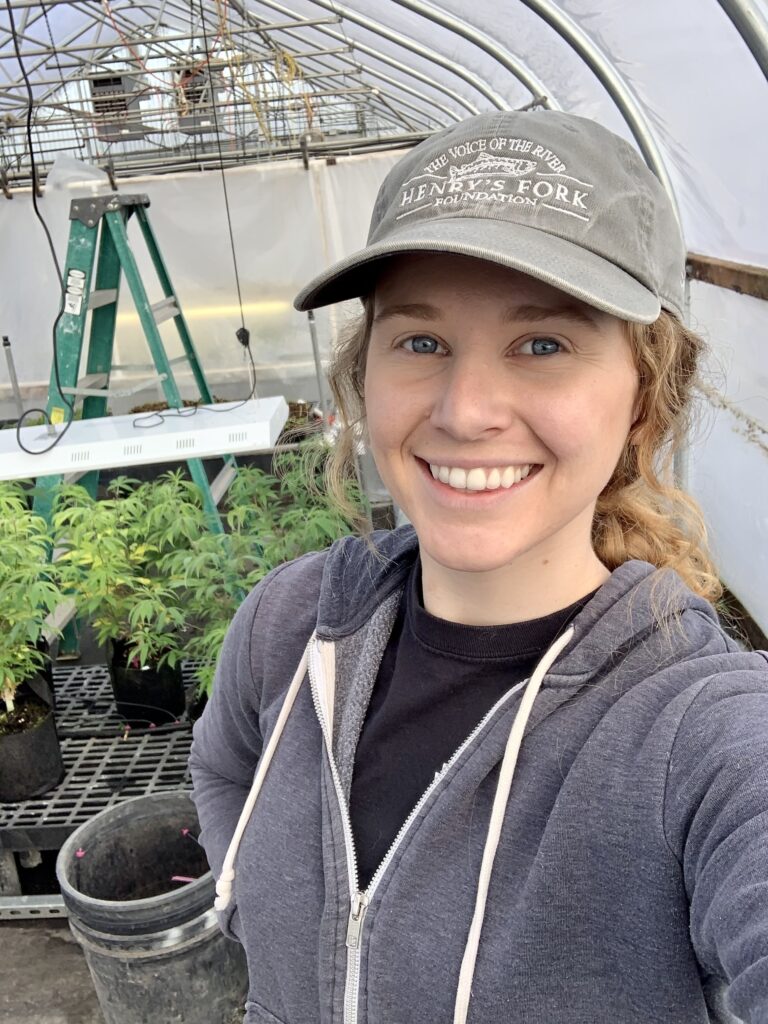 Dalyn McCauley in a greenhouse