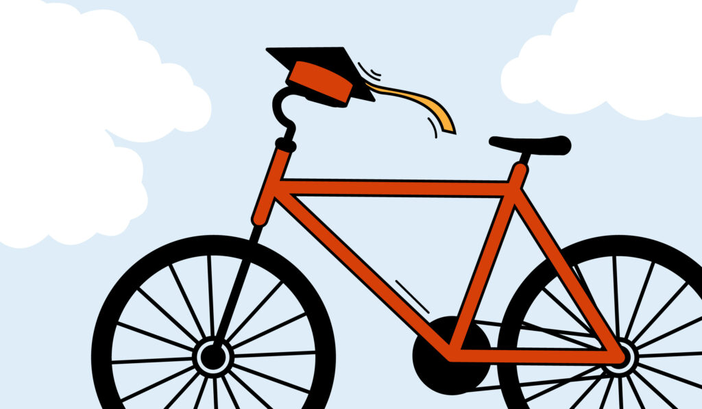 Cartoon of an orange bike wearing a graduate hat.