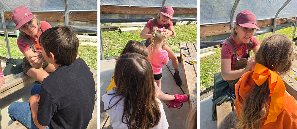 Master Gardener volunteer facepainting the students of Riley Creek Elementary