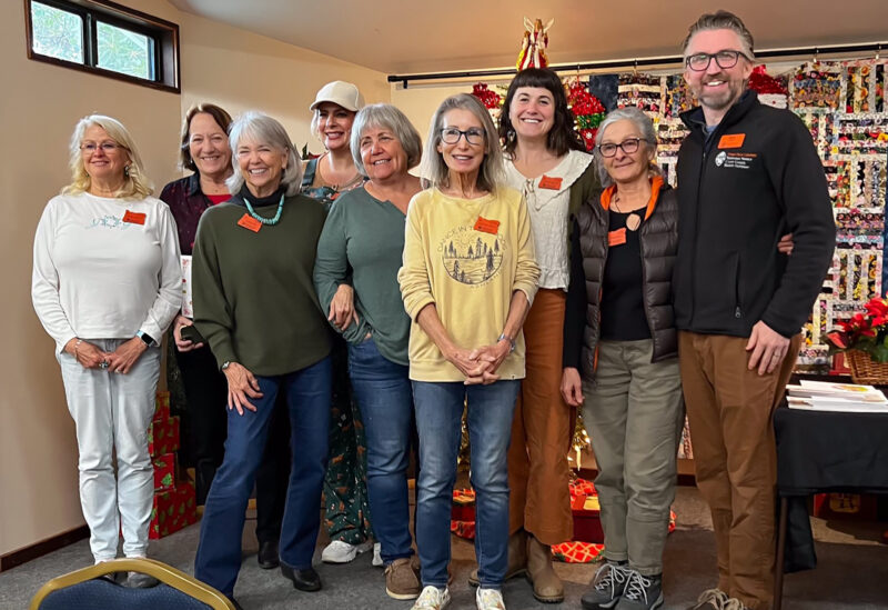 Some of the 2025 Graduating class at holiday party by Jeffrie Hall